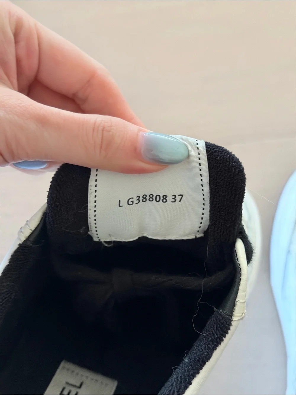 CHANEL White & Black Interlocking CC Logo Leather Sneakers